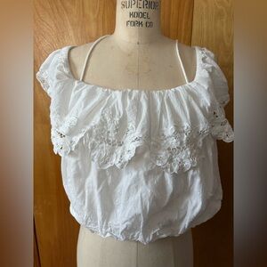 Free People cropped top with lace trim and tassles size L